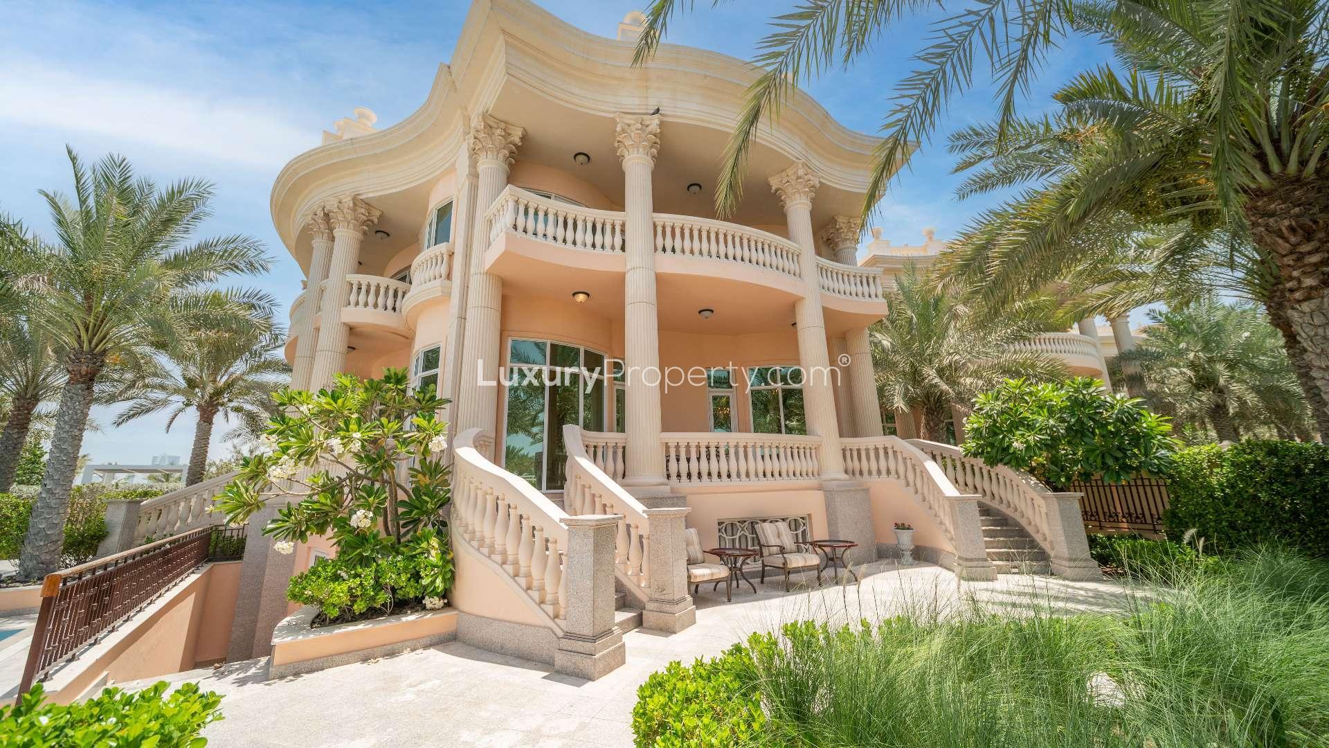 Luxurious dining room in European-style villa, Palm Jumeirah, featuring elegant decor and chandelier