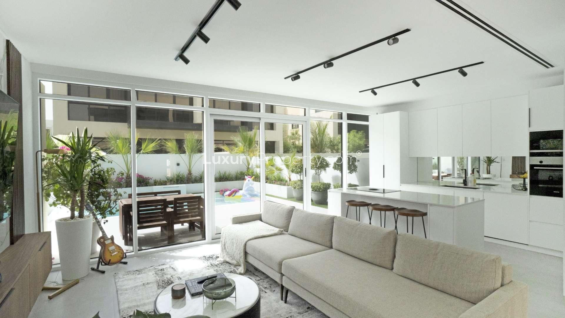 Exterior view of 4-bedroom villa with carport in Damac Hills, The Field