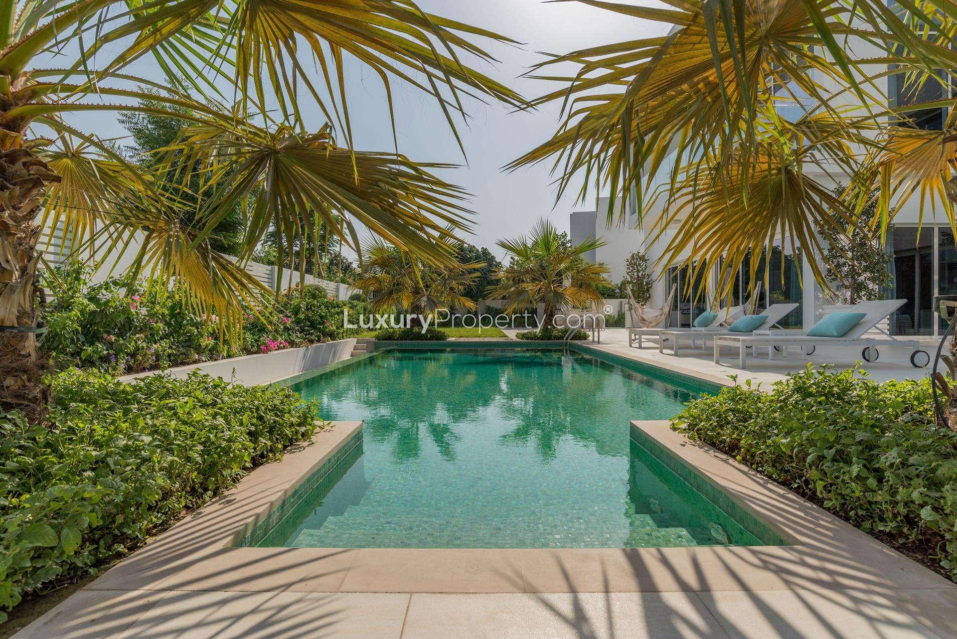 Exquisite 4-bedroom villa exterior at The Nest, Al Barari, Dubai, surrounded by lush greenery