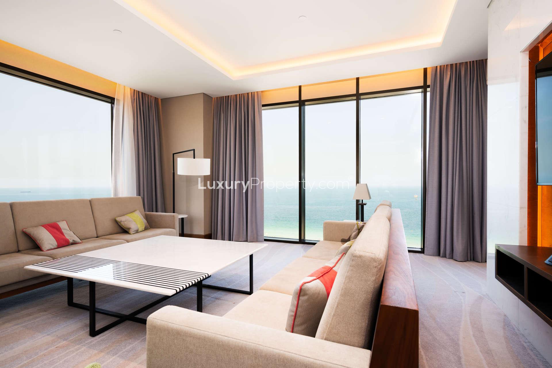 Luxurious living room with ocean view at Caesars Bluewaters Dubai apartment for rent