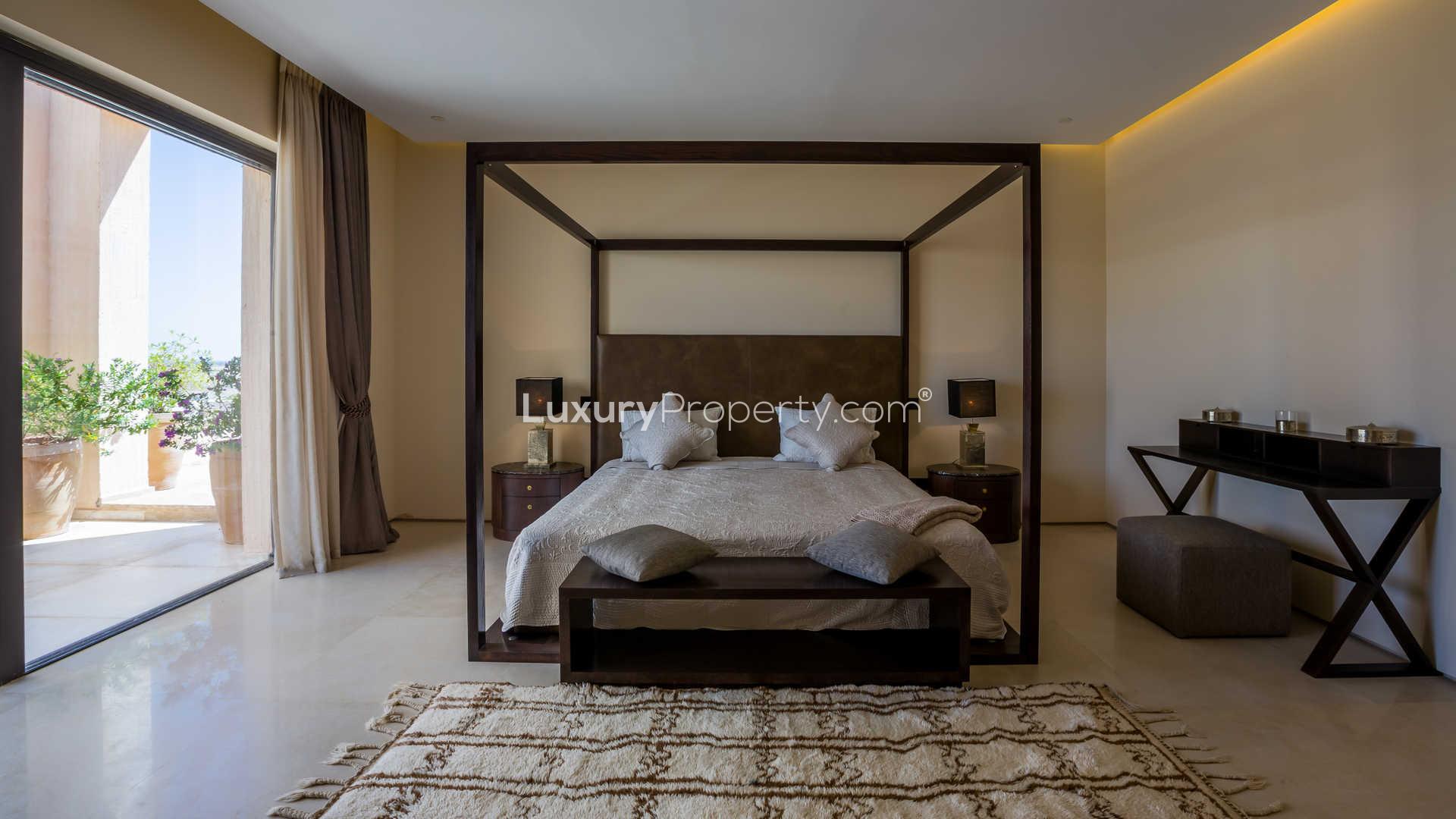 Luxurious bedroom in four-bed villa, Ritz-Carlton Residences, Marrakech, with garden view