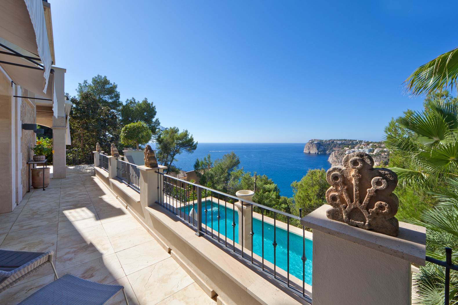 Interior of Spanish villa bedroom with ocean view in Port d'Andratx, Mallorca