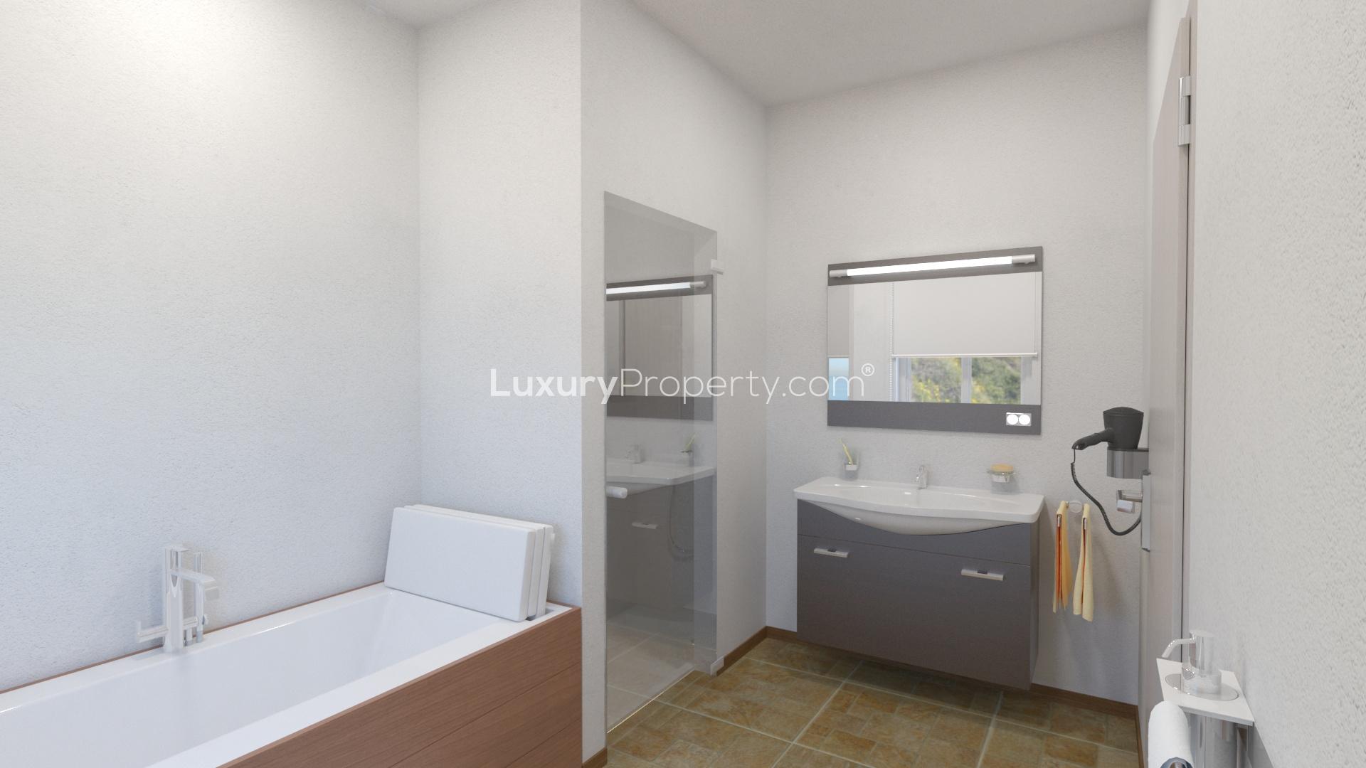 Luxurious Villa Catherine bedroom with sea view, Crete. Modern decor and natural light