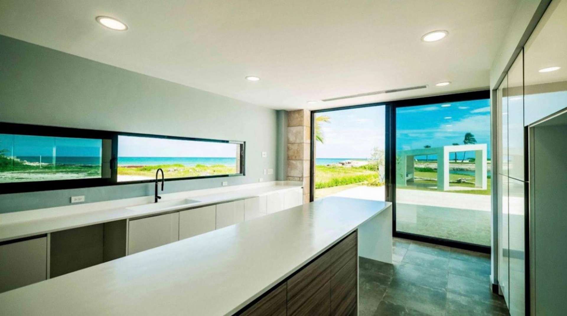 Luxurious Villa Cayuco 16 living room with pool view, Cap Cana, Punta Cana