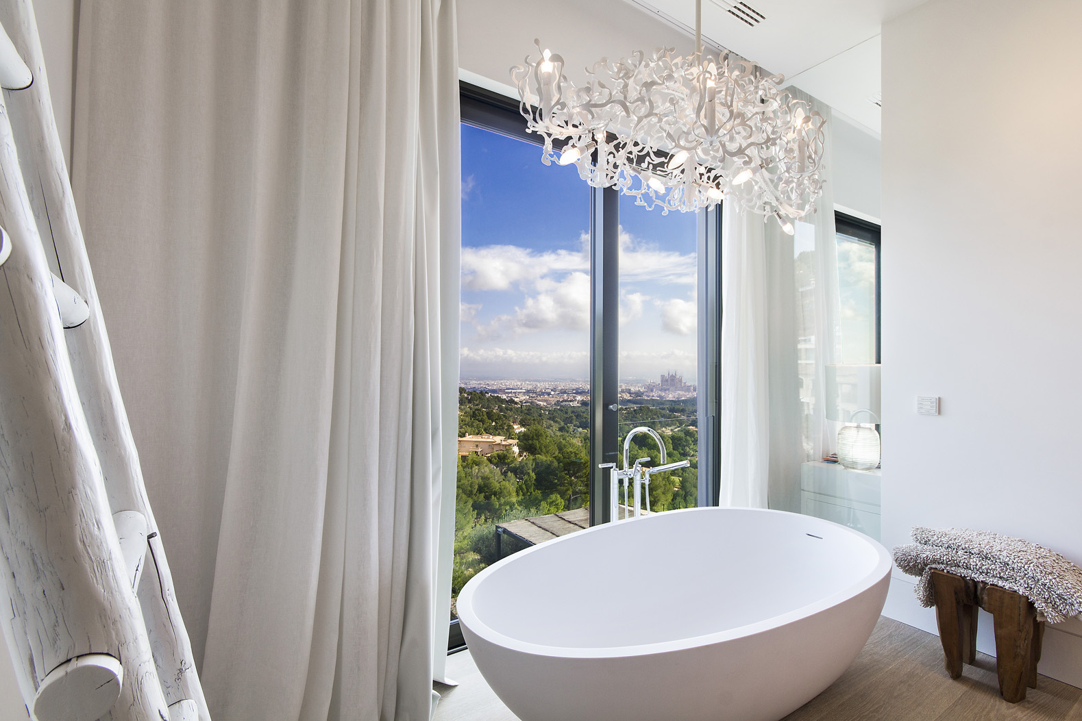 Modern wine cellar in elegant Son Vida villa, Mallorca, featuring wooden shelves and wine bottles
