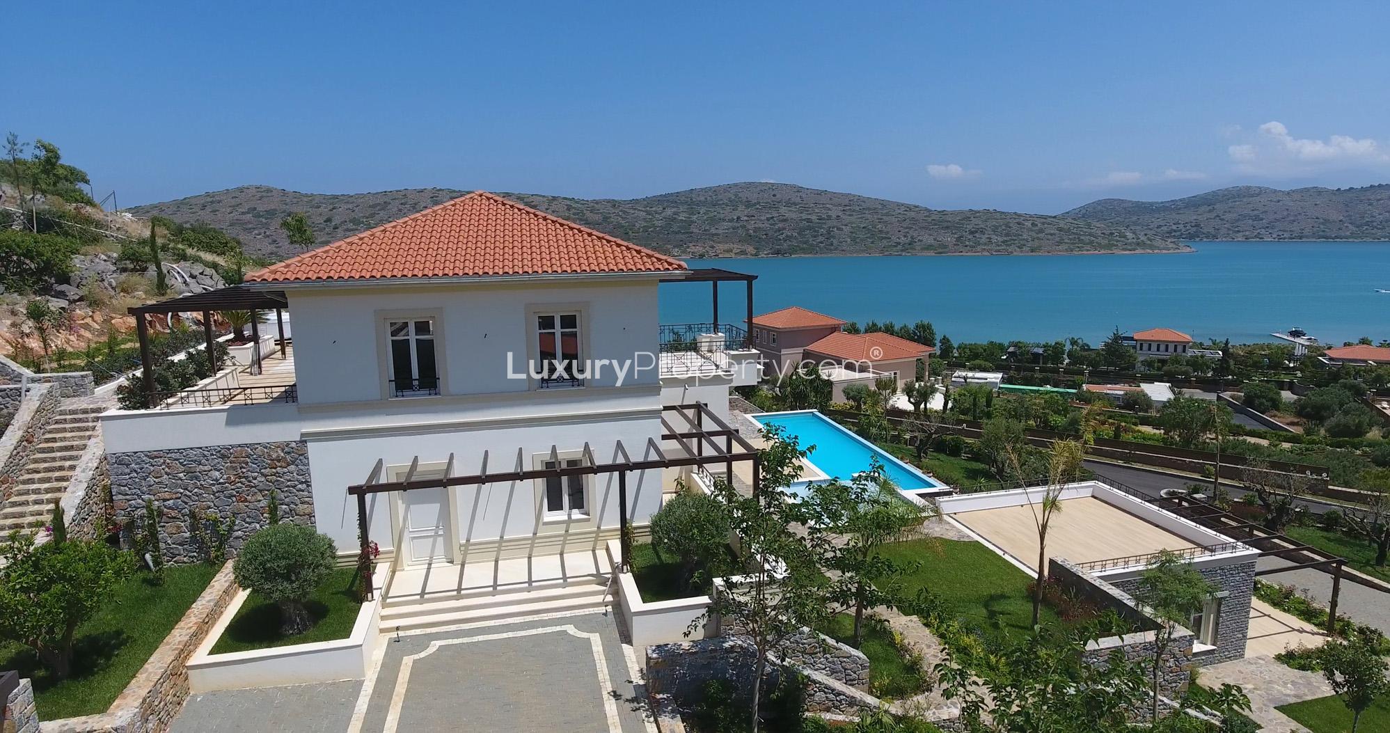 "Stunning waterfront villa in Crete, Villa Sophia, with sea view and lush garden.",Four-bedroom waterfront villa with pool and sea view at Villa Sophia, Crete, Greece