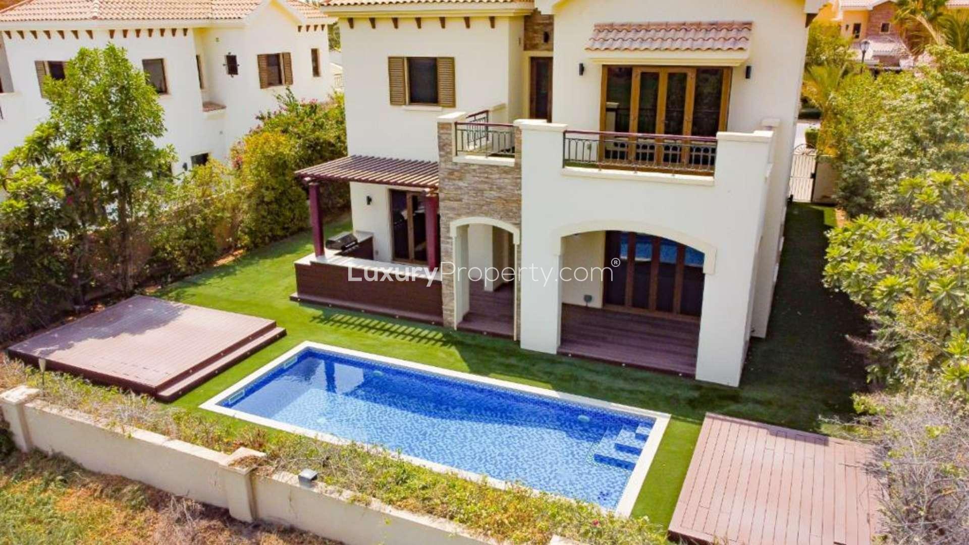Luxury villa balcony with stunning lake and golf course view, Jumeirah Golf Estates