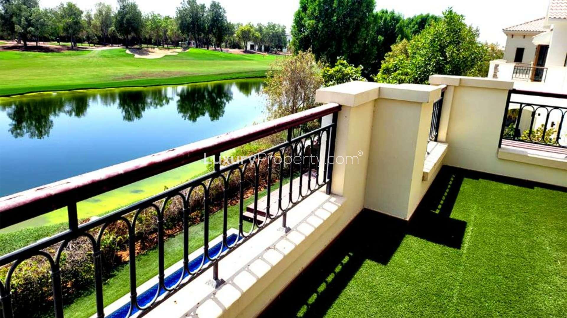 Fully upgraded villa pool with stunning lake and golf course view in Jumeirah Golf Estates
