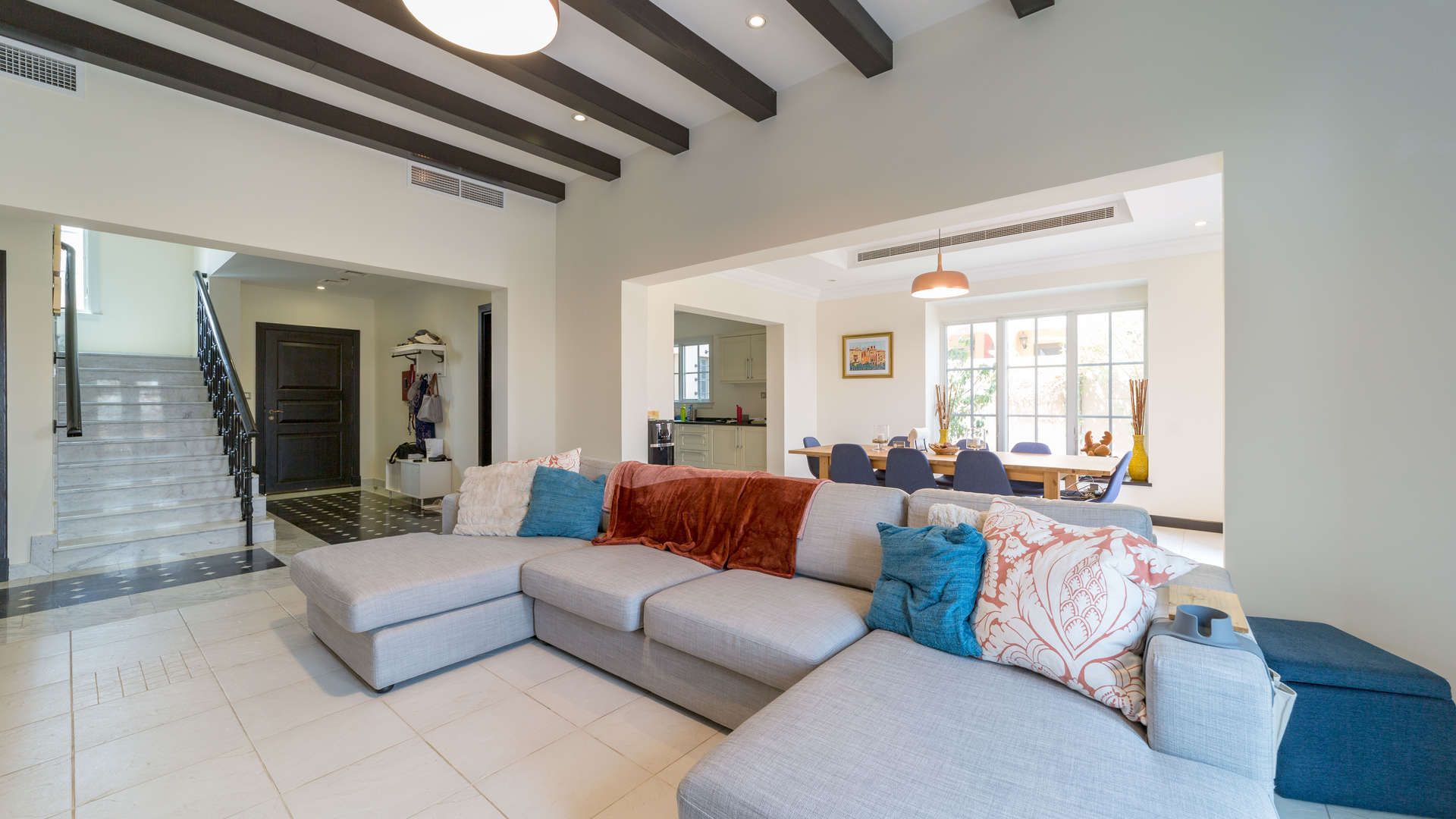 Luxurious living room in Whispering Pines villa, Jumeirah Golf Estates, modern design, spacious layout