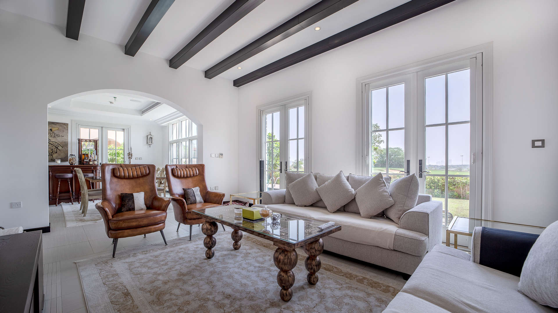 Elegant stone facade of 4-bedroom villa in Whispering Pines, Jumeirah Golf Estates