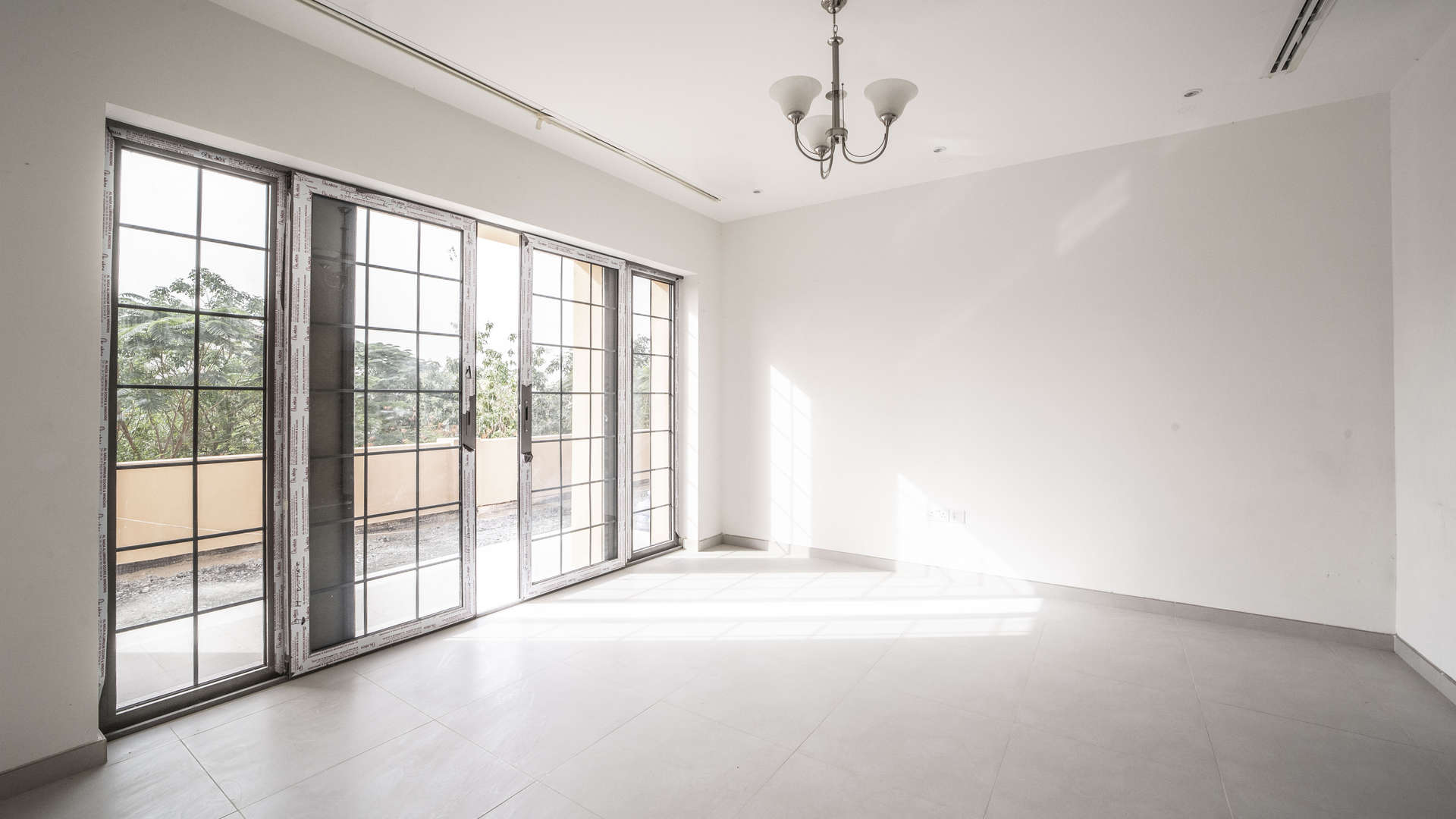 Tuscan-style villa exterior in Whispering Pines, Jumeirah Golf Estates, available for sale