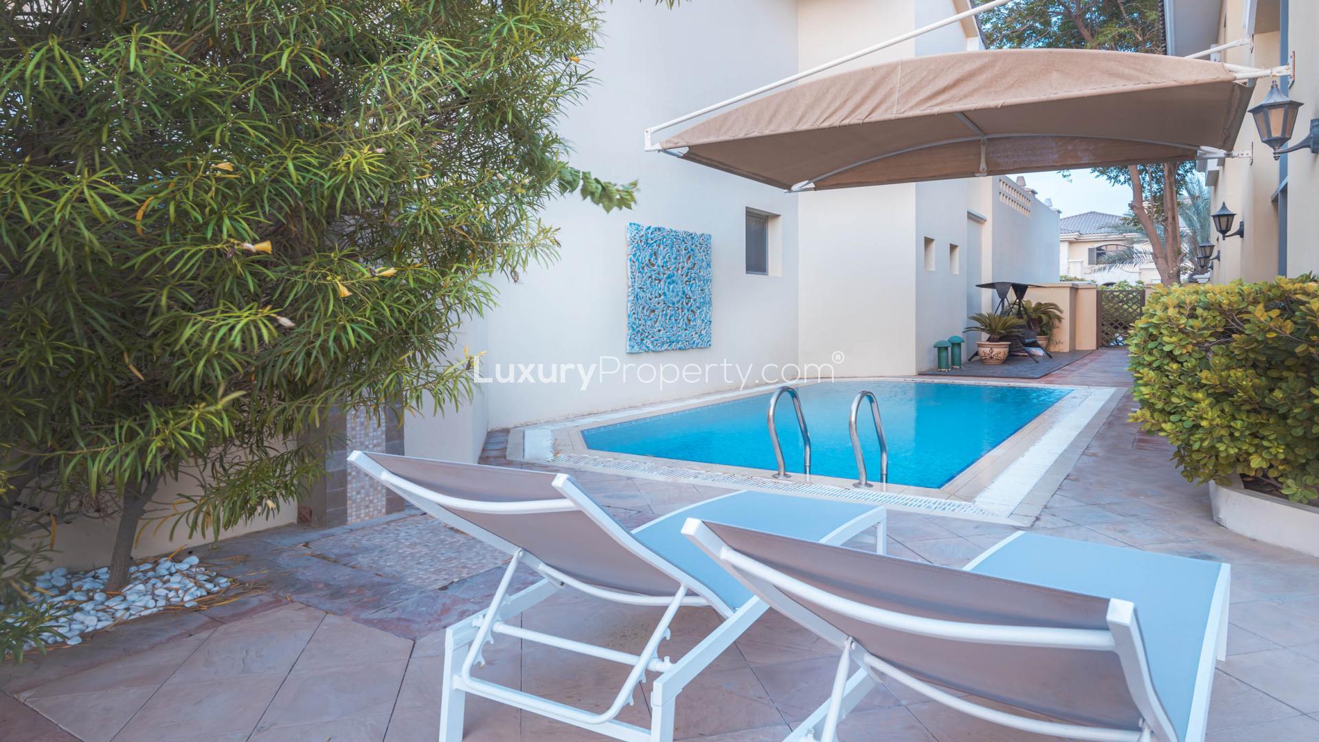 Exceptional 4-bedroom villa on Palm Jumeirah beachfront, Garden Homes community, short-term rental