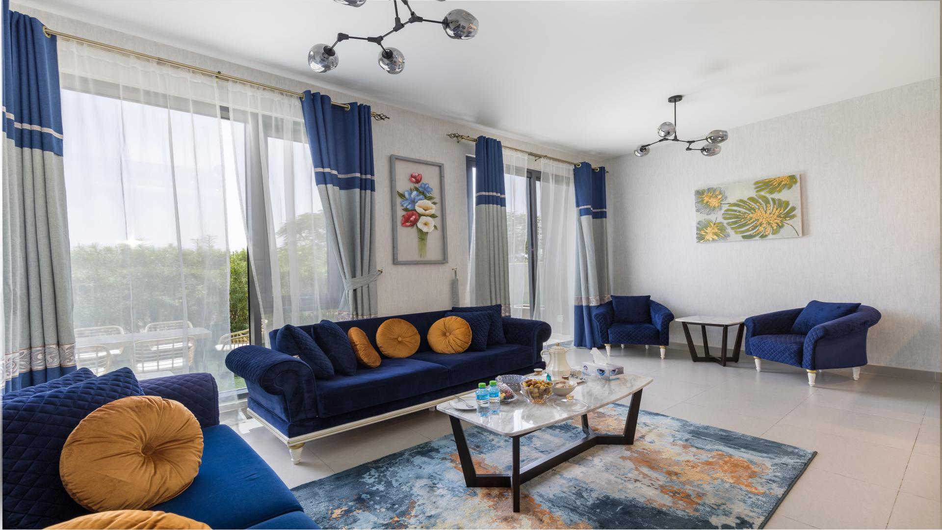 Outdoor seating area in spacious Dubai Hills townhouse garden, Maple community