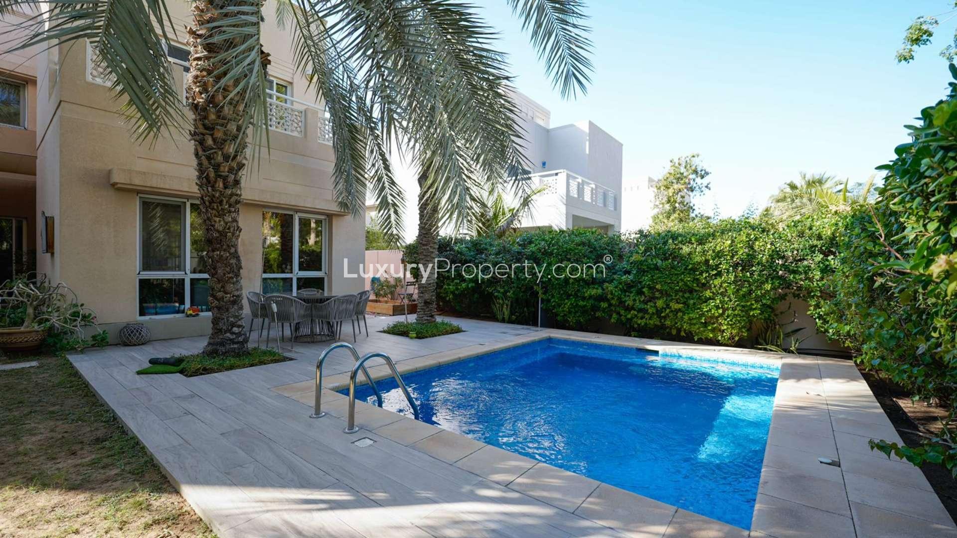 Contemporary living room in fully upgraded Meadows 6 villa with modern decor and greenery