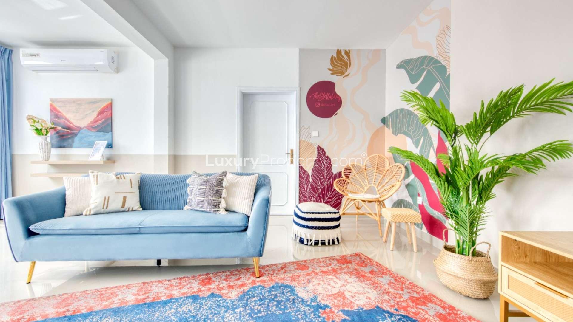 Outdoor seating area and pool at spacious beachfront villa, Umm Suqeim, for rent