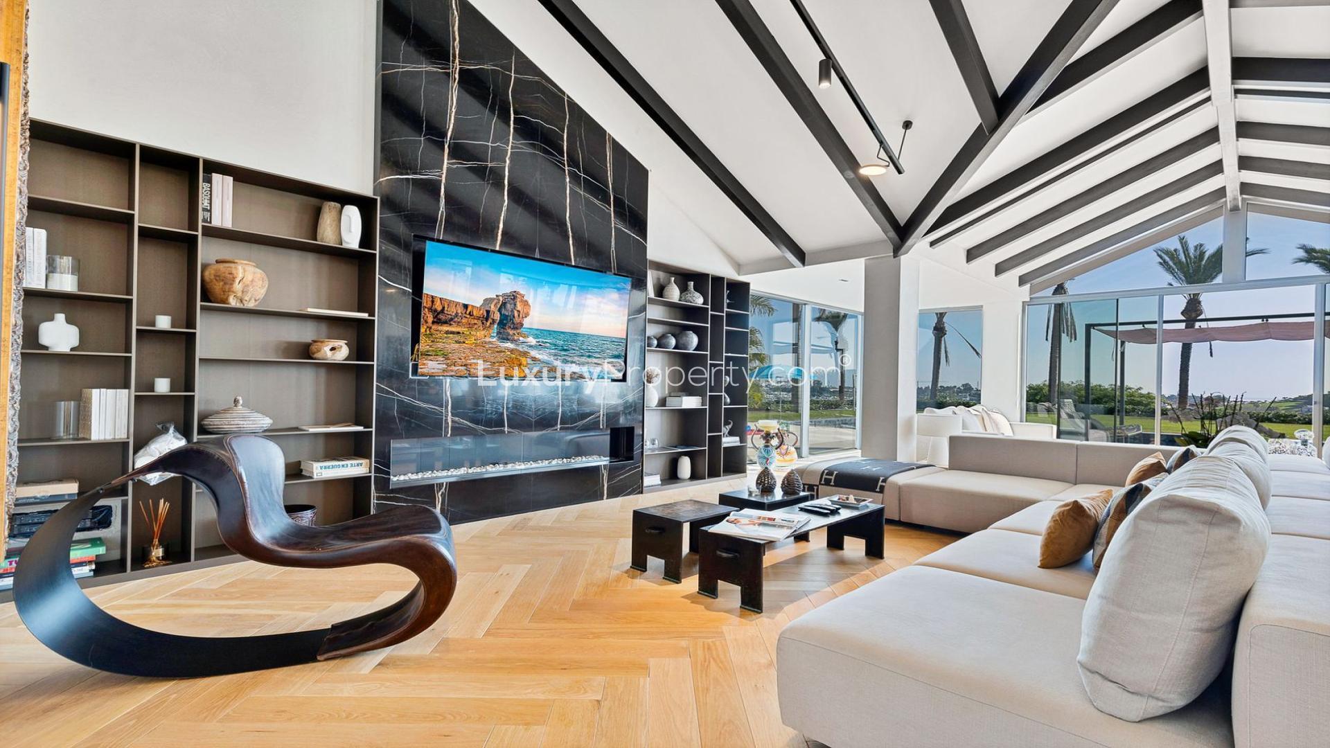 Outdoor terrace of luxury villa in Benahavís with pool and scenic views