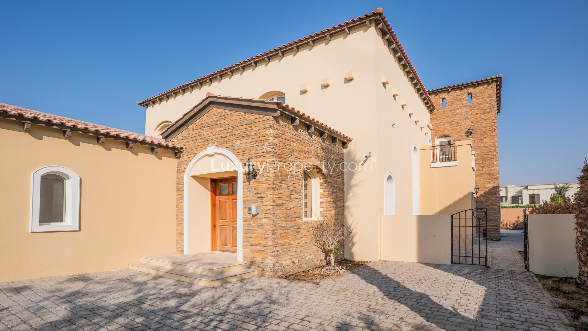 Spacious living room in 5-bedroom villa with marble floors, Jumeirah Golf Estates, Fire community