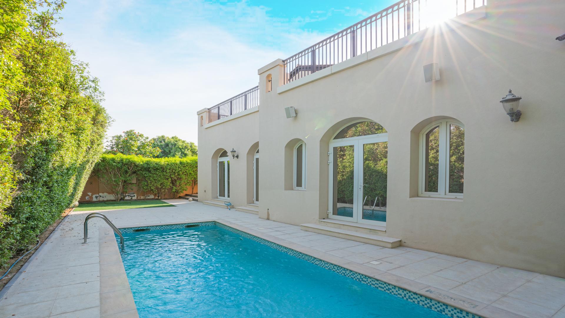 Villa exterior with landscaped garden in Jumeirah Golf Estates, Fire community, for rent