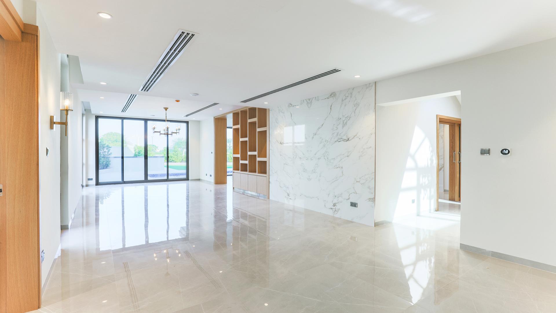 Fully upgraded 5-bedroom villa with garage and lush landscaping in Jumeirah Golf Estates