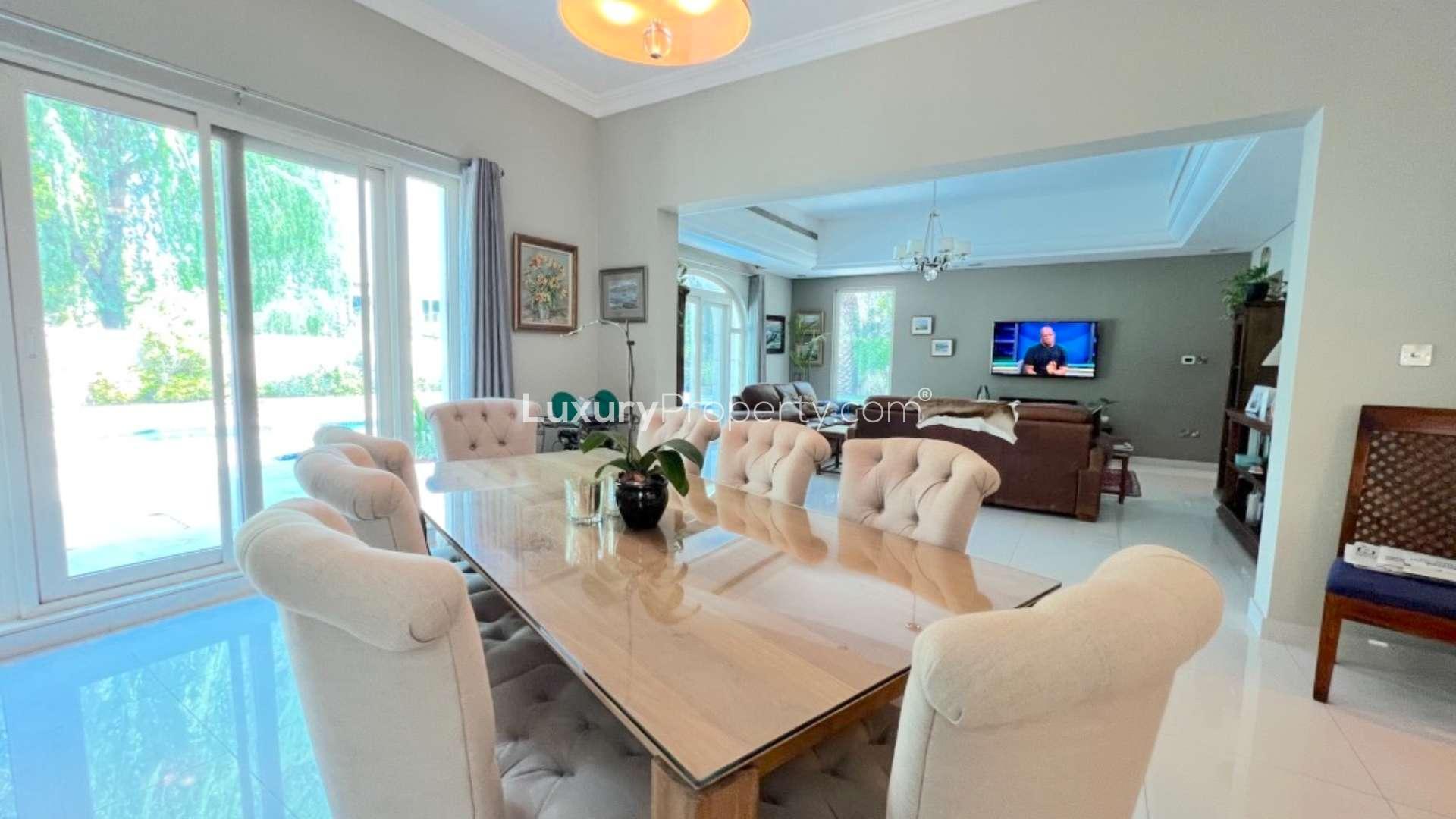 Spacious living room in upgraded C1 villa, Victory Heights, Dubai Sports City, with pool view