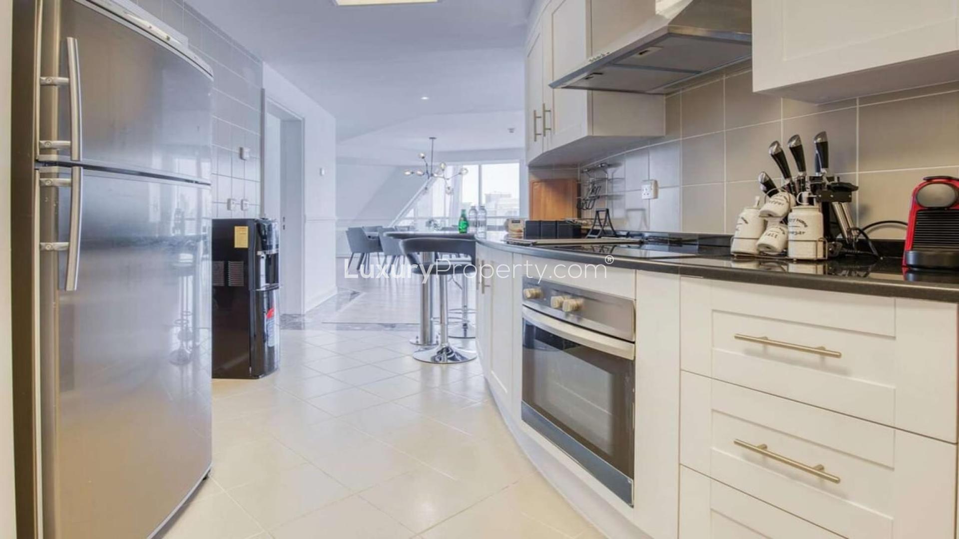 Luxurious living area in 5-bedroom duplex penthouse, Dubai Marina, modern decor and spacious layout