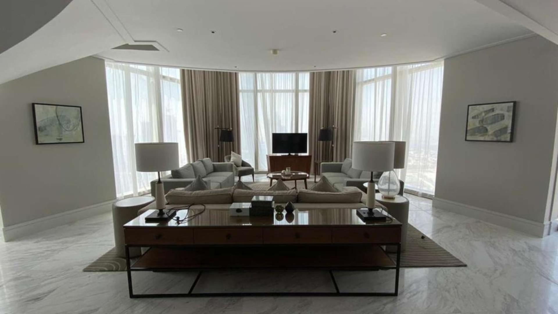 Luxurious living room in Vida Sky Collection penthouse, Downtown Dubai, with elegant decor