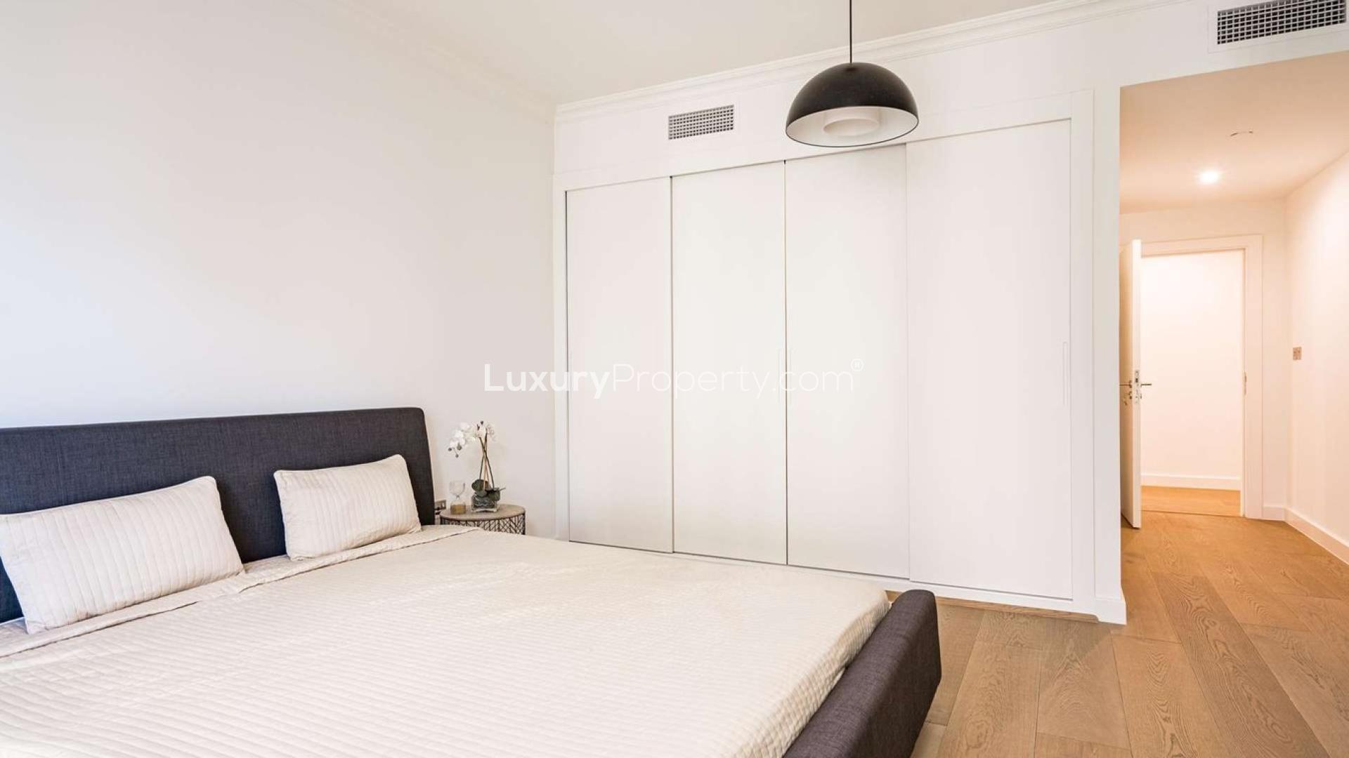 Modern living room in 5-bedroom JBR penthouse with stylish decor and natural light