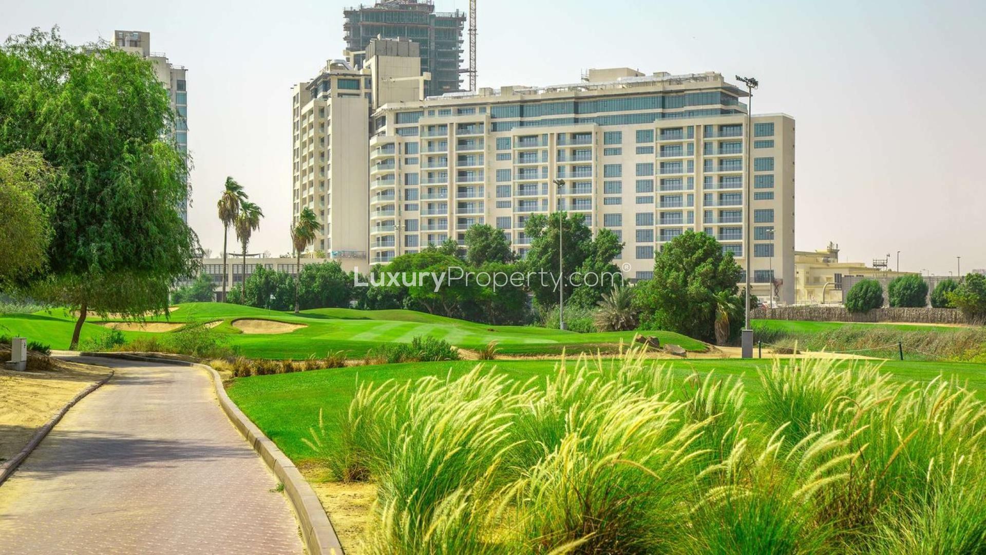 Empty penthouse room with large windows and stunning golf course views, The Hills C