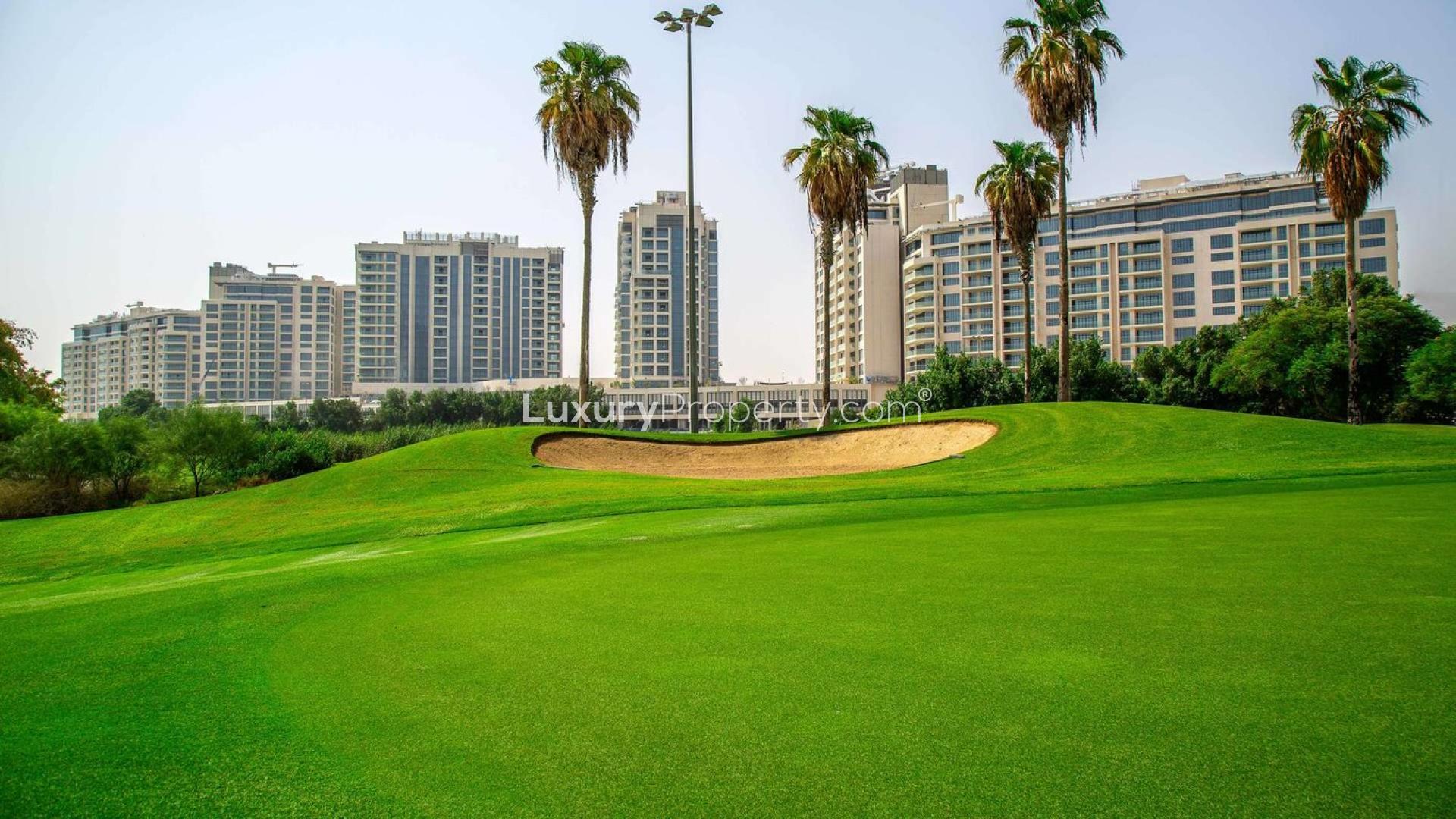 Penthouse view at The Hills A with city skyline and golf course in background