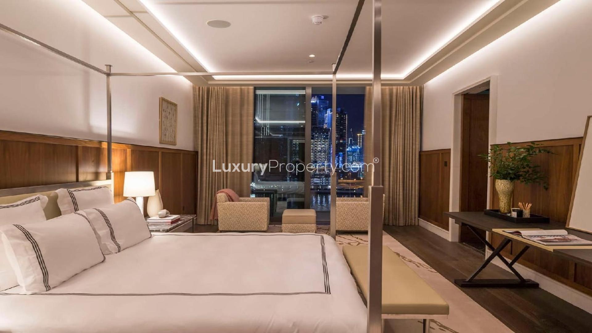 Luxurious bedroom in Dorchester Collection penthouse, Business Bay, with stunning city views