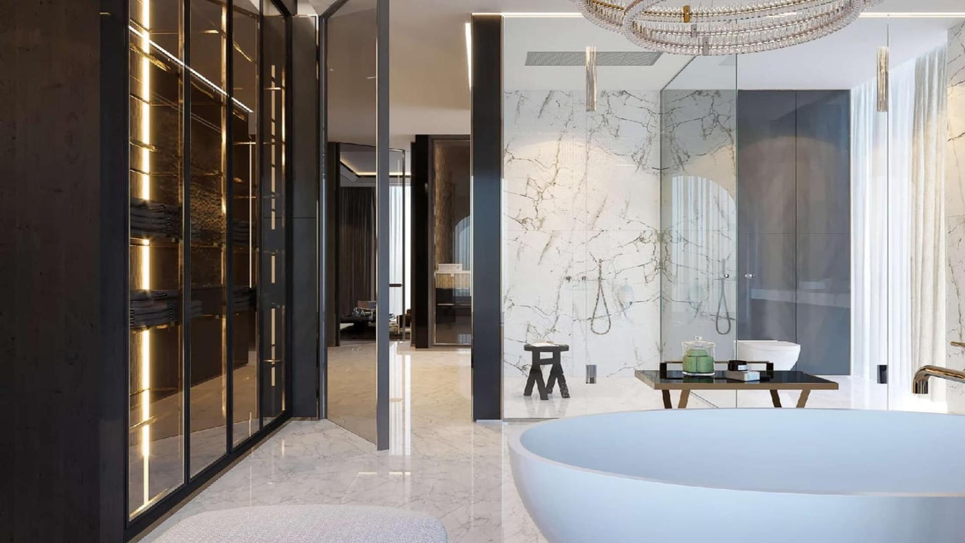 Luxurious living room in Dubai duplex penthouse with elegant spiral staircase and modern decor