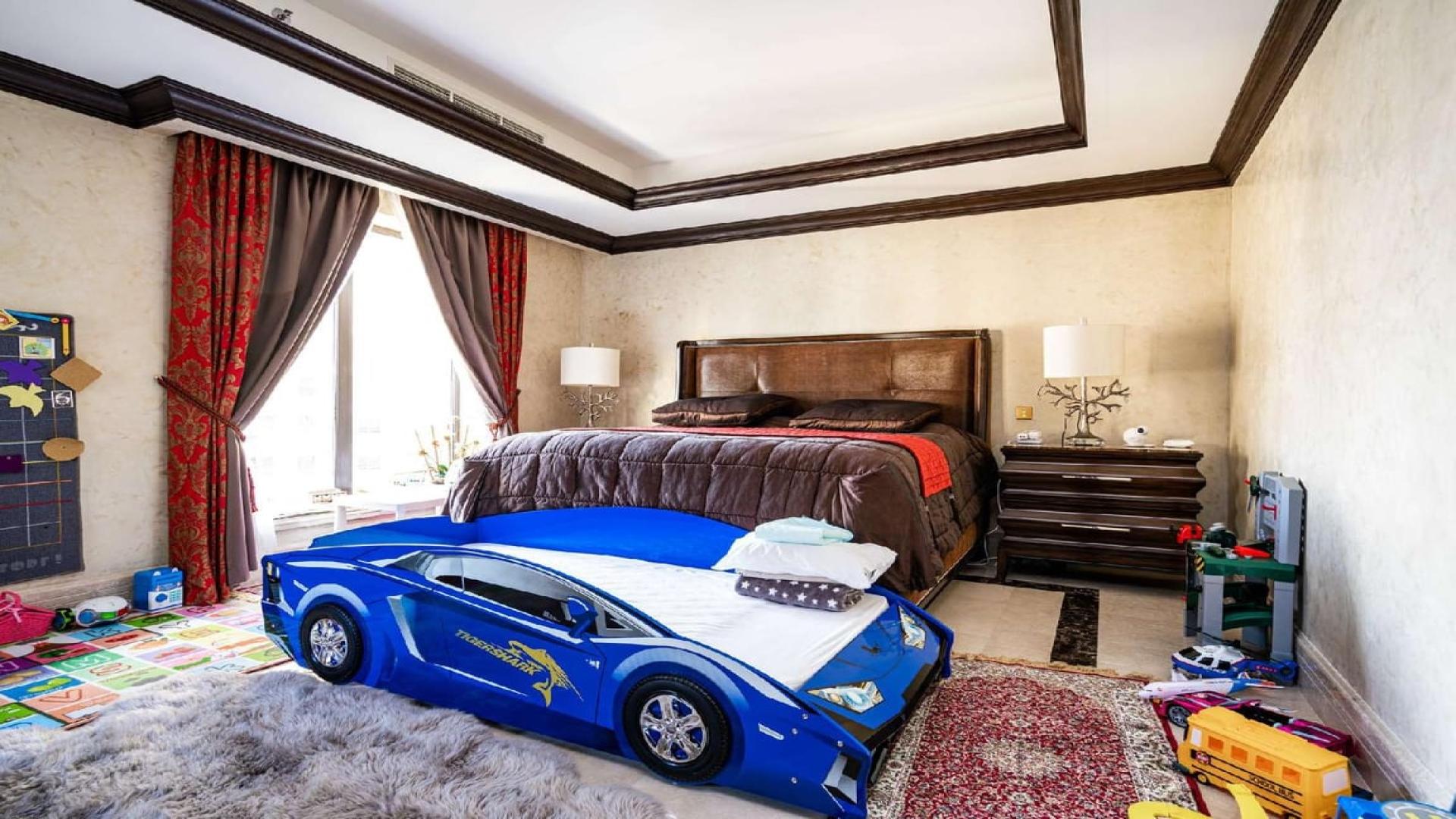 Luxurious living area in JBR penthouse with elegant decor and pool view