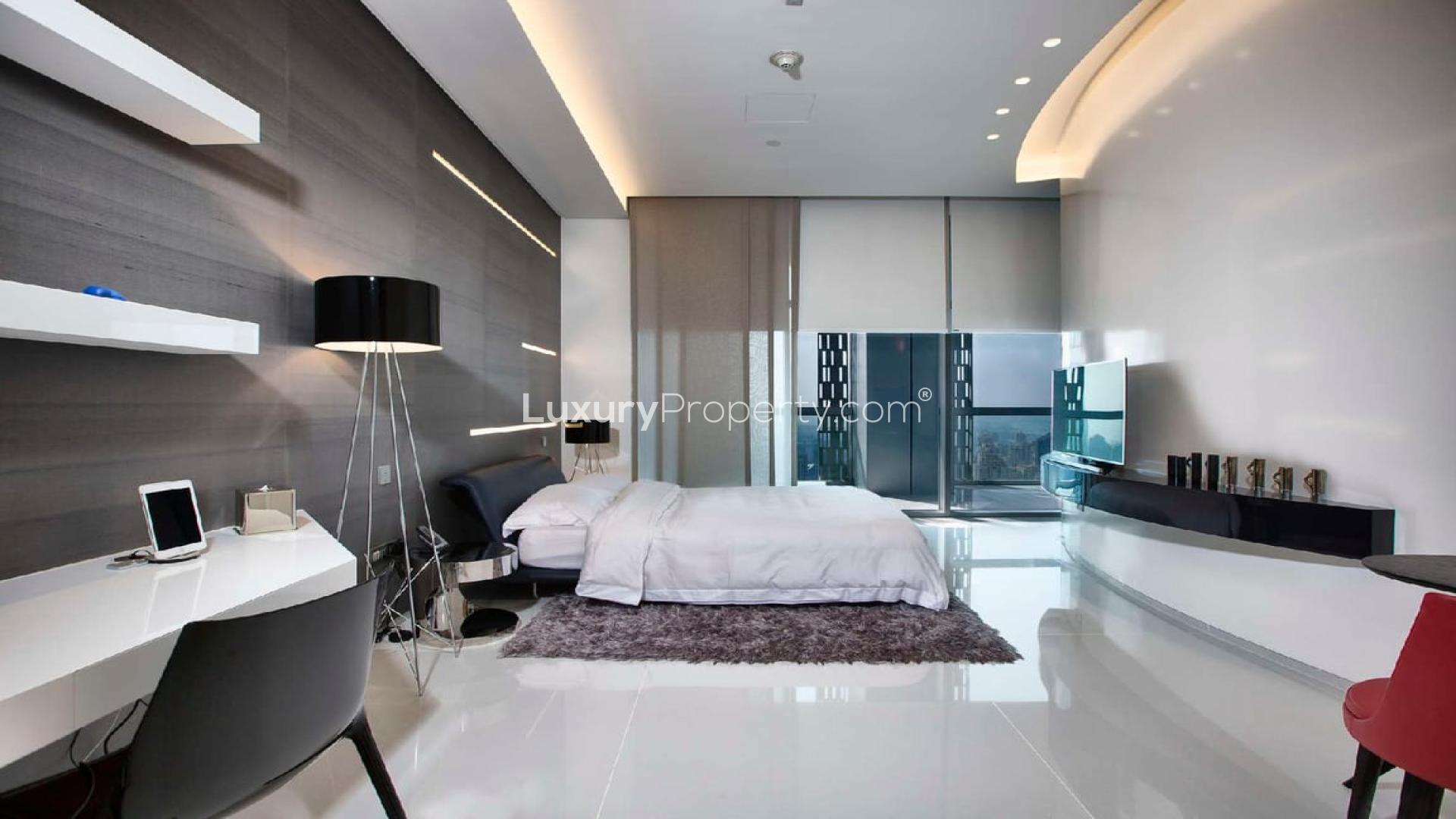 Modern dining area in luxury penthouse, Cayan Tower, Dubai Marina with elegant decor