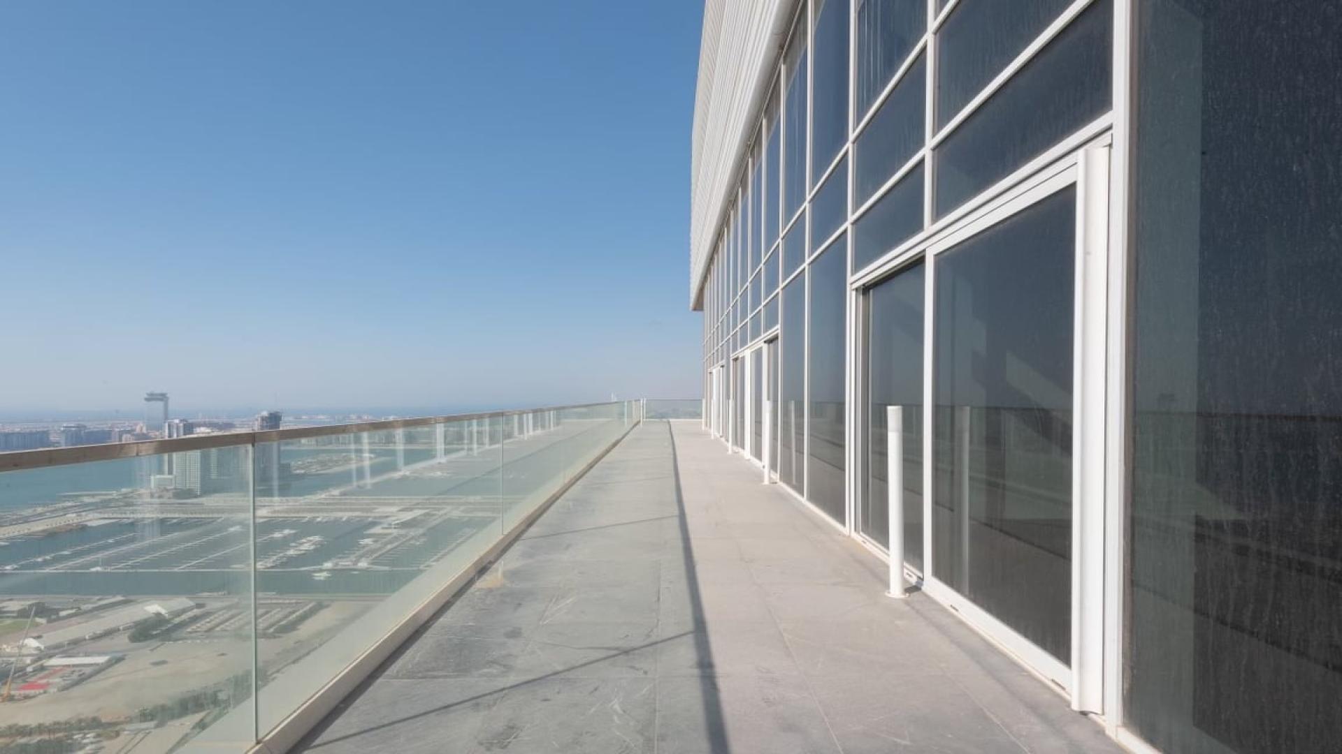 Open-plan living area in beachfront duplex penthouse, Jumeirah Beach Residence, for sale