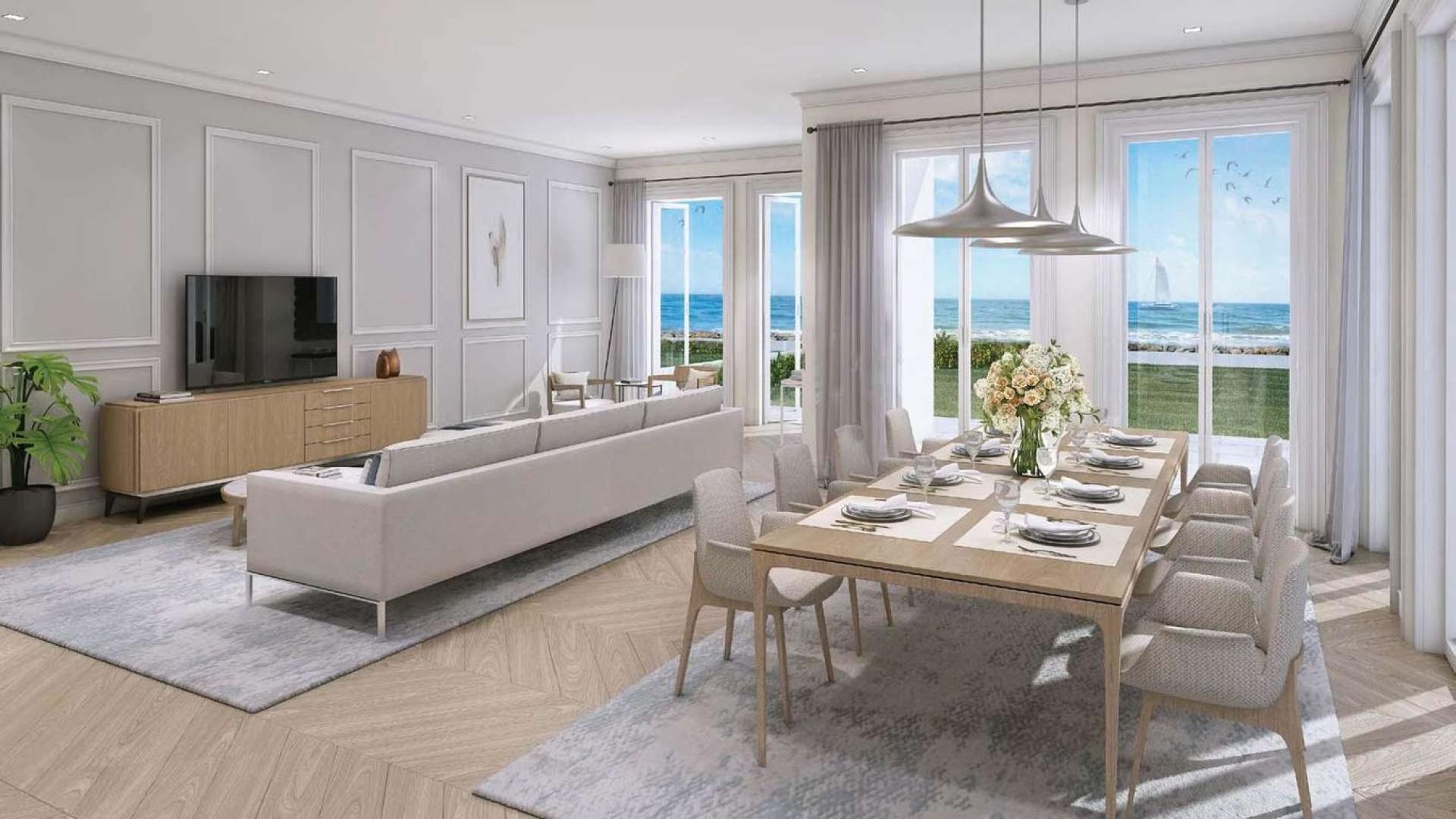 Sea-facing living and dining area in five-bedroom townhouse, La Mer, Jumeirah for sale