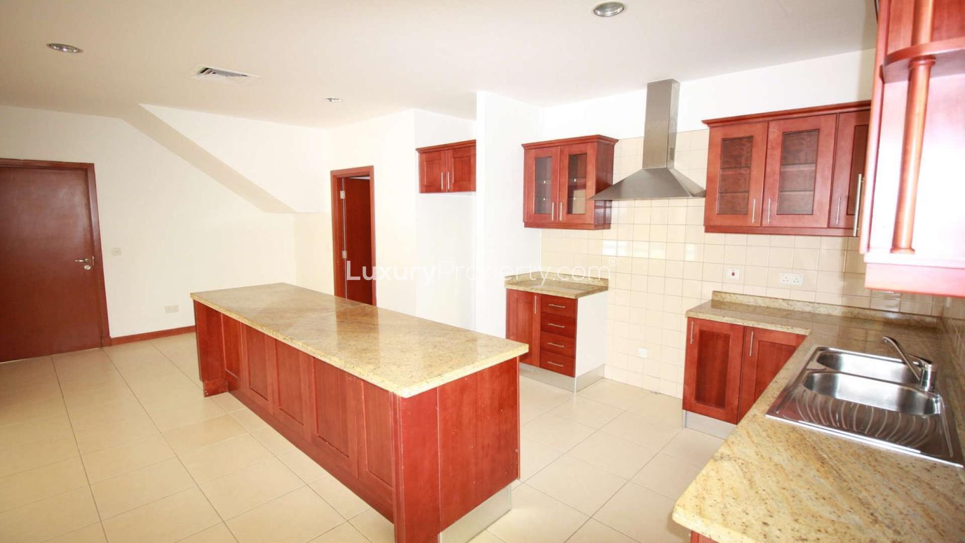 Bright room with large windows and built-in wooden closet in Saheel villa, Arabian Ranches