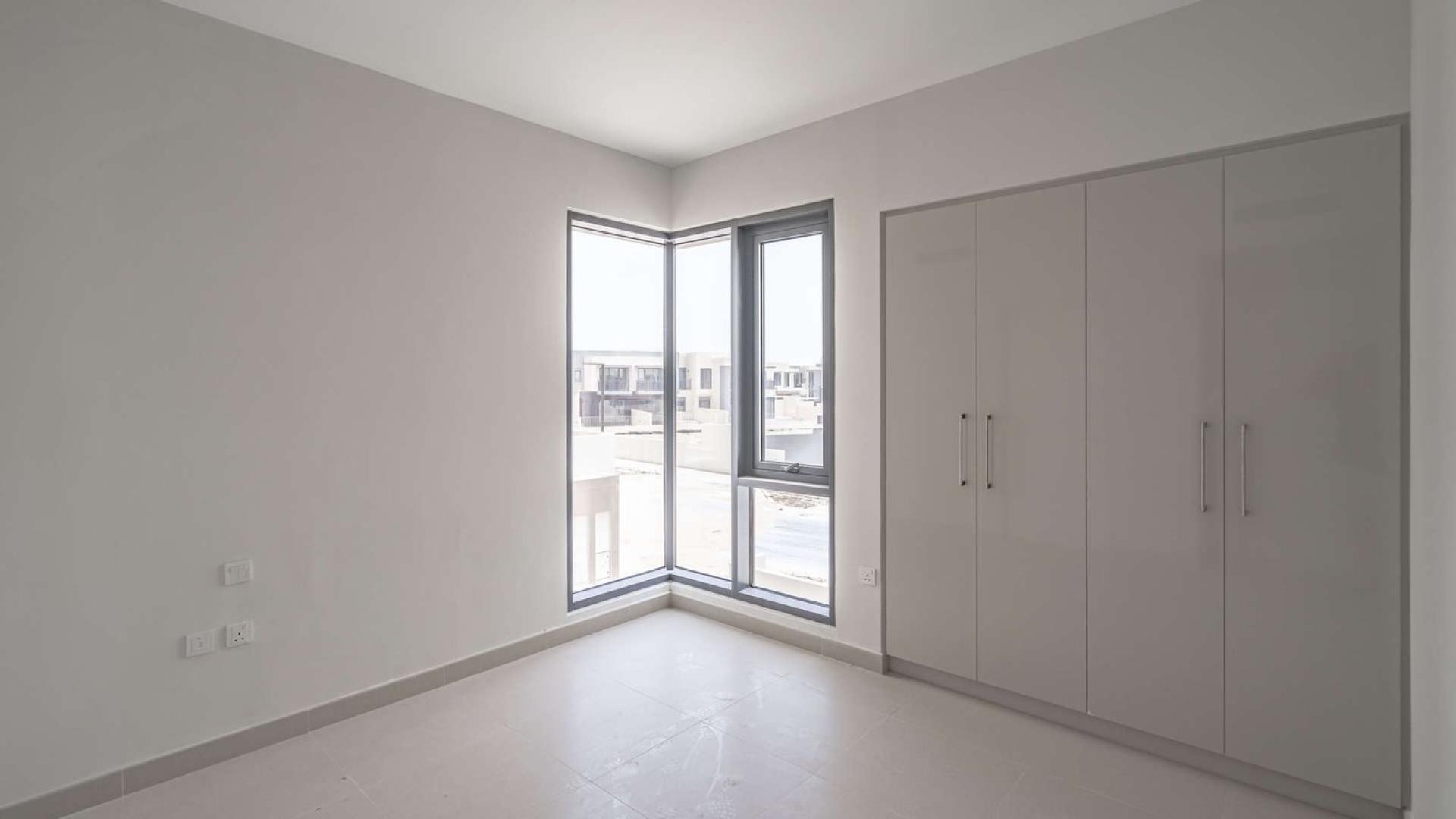 Modern kitchen and staircase in 5-bedroom townhouse, Maple, Dubai Hills Estate