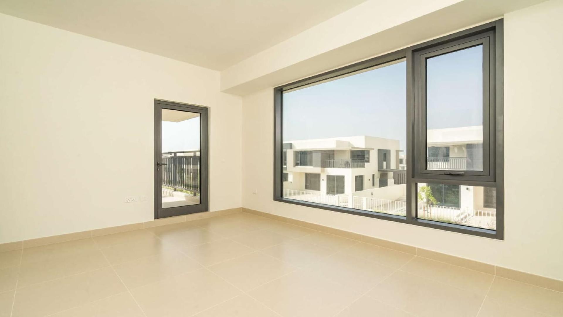 Modern living room in 5-bedroom villa, Maple 1, Dubai Hills Estate, with stylish decor