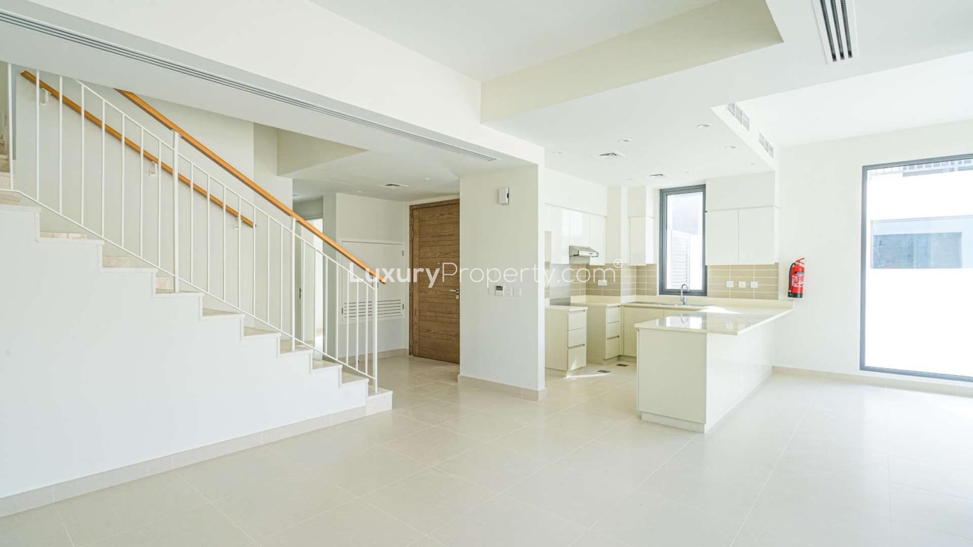 Modern interior of Maple Villa in Dubai Hills Estate, featuring spacious entry and staircase