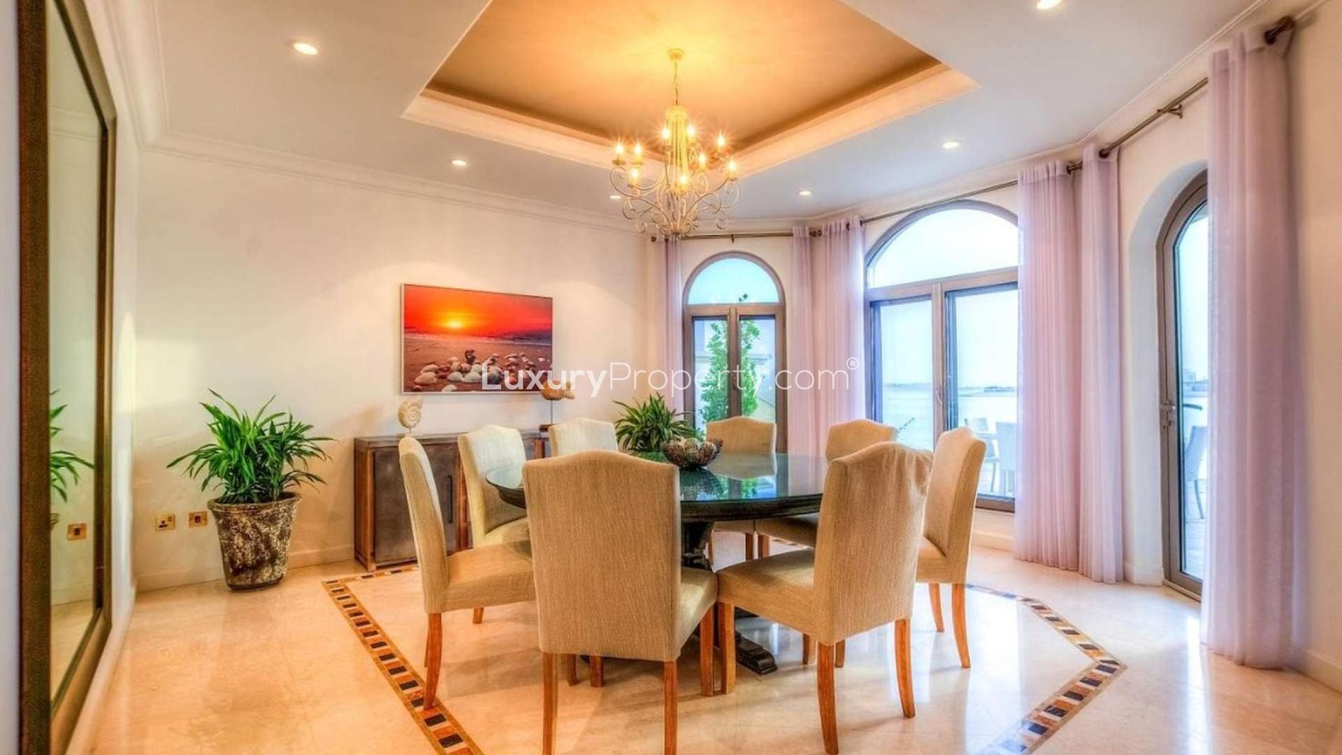 Luxurious modern kitchen in Palm Jumeirah villa, featuring sleek cabinetry and spacious layout