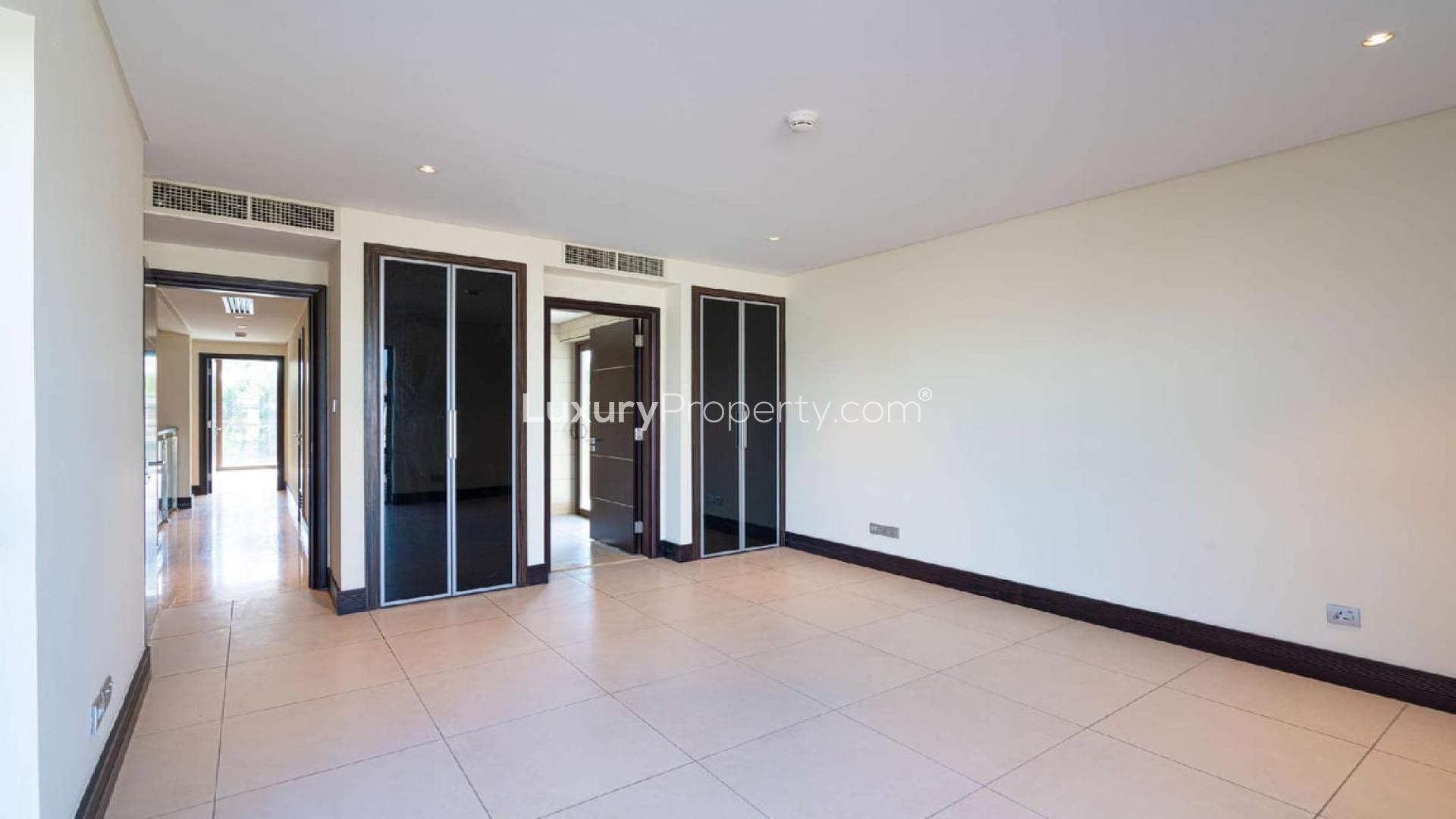 Luxurious villa interior with pool view, Sanctuary Falls, Jumeirah Golf Estates, Dubai