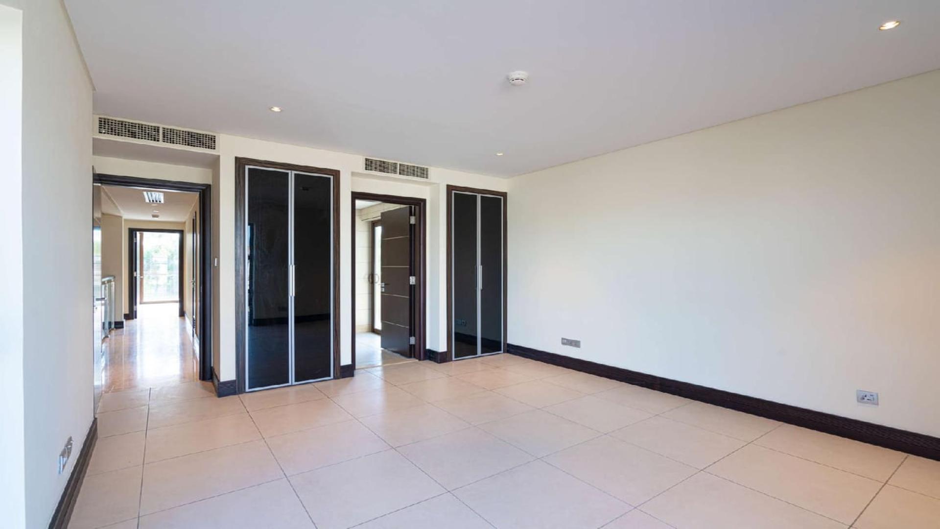 Luxurious villa interior with pool view, Sanctuary Falls, Jumeirah Golf Estates, Dubai