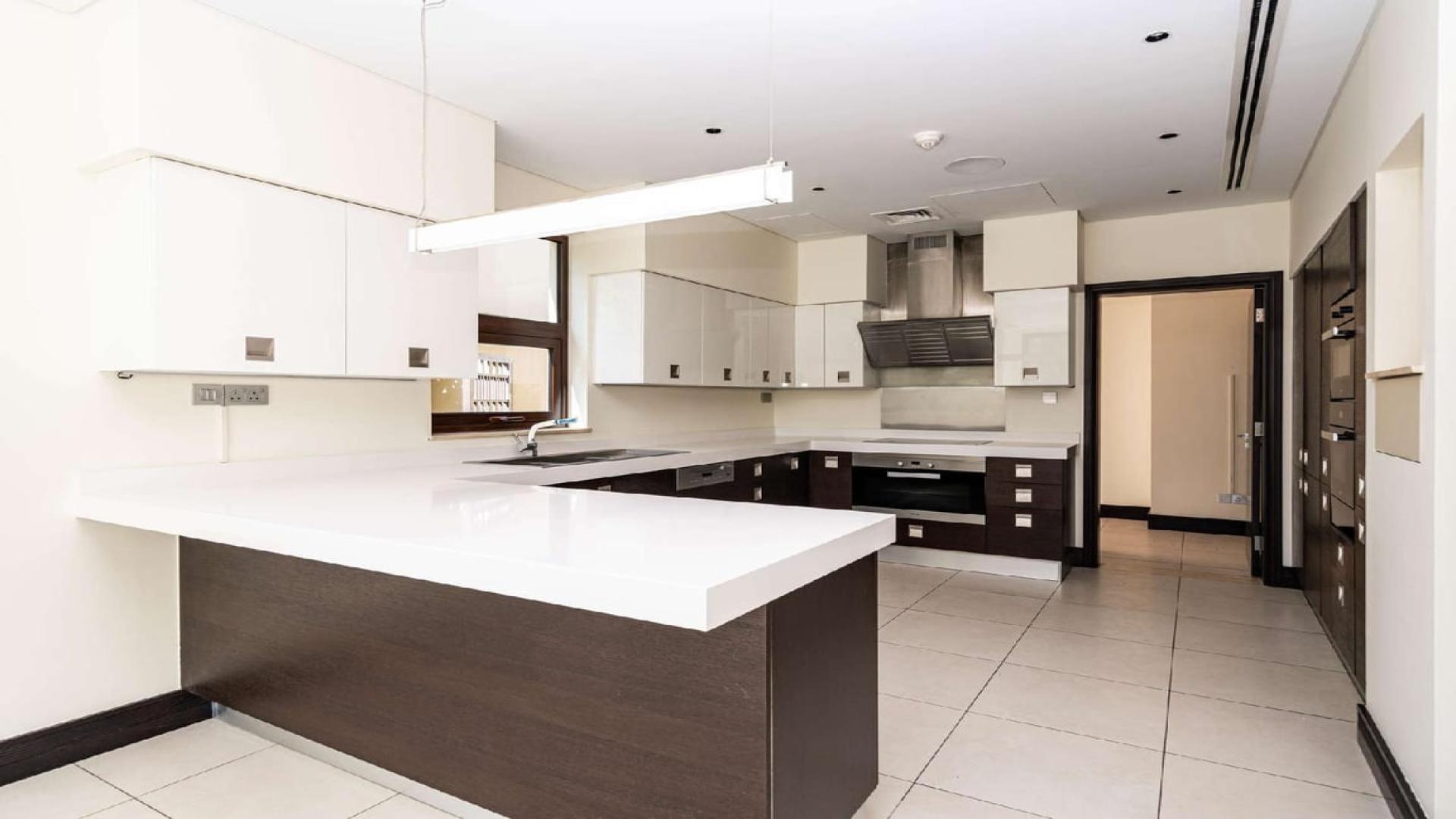 Luxurious 5-bedroom villa exterior in Sanctuary Falls, Jumeirah Golf Estates, Dubai for rent