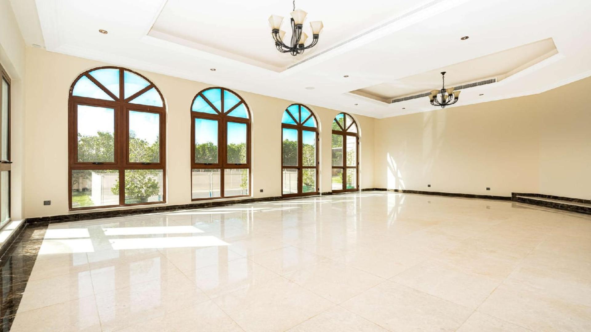 Spacious living room in 5-bedroom villa at Jumeirah Golf Estates, Orange Lake, for rent