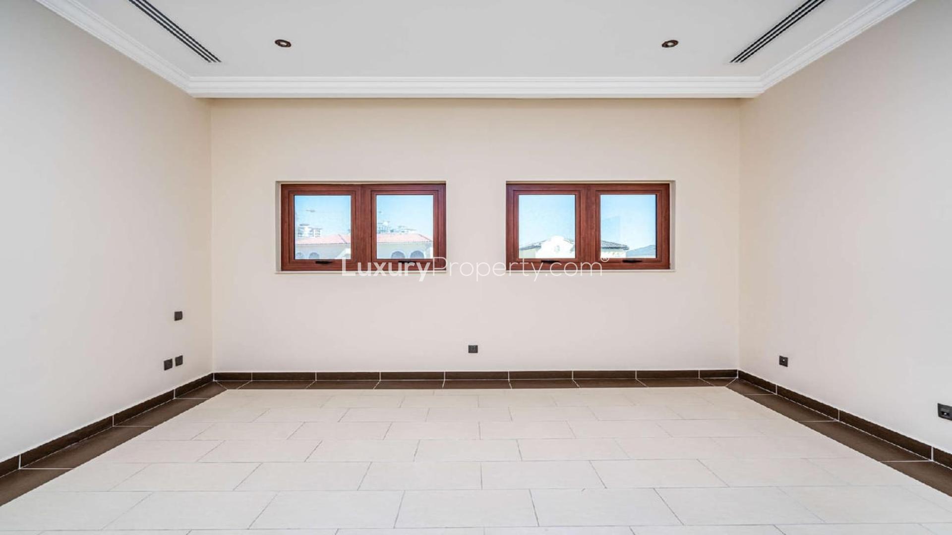 5-bedroom villa for rent in Orange Lake, Jumeirah Golf Estates, spacious driveway, elegant architecture