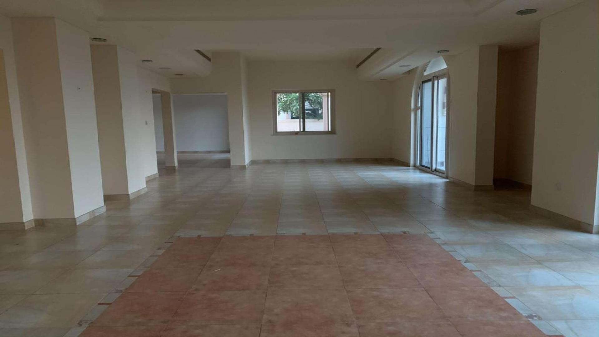 Window view from 5-bedroom villa in Victory Heights, Dubai, overlooking golf course