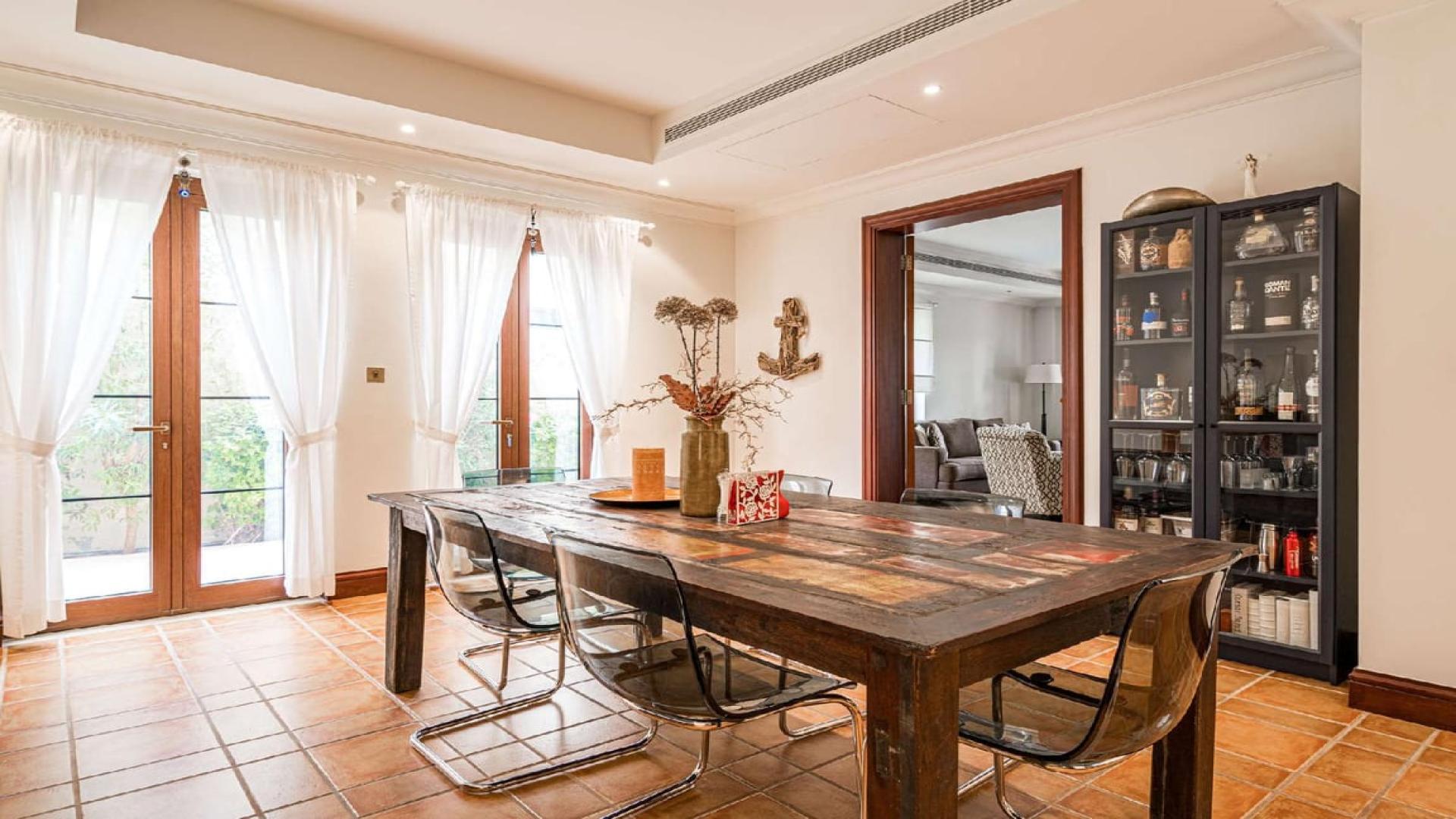 Upgraded Girona-style villa exterior in Jumeirah Golf Estates, Earth community, for rent