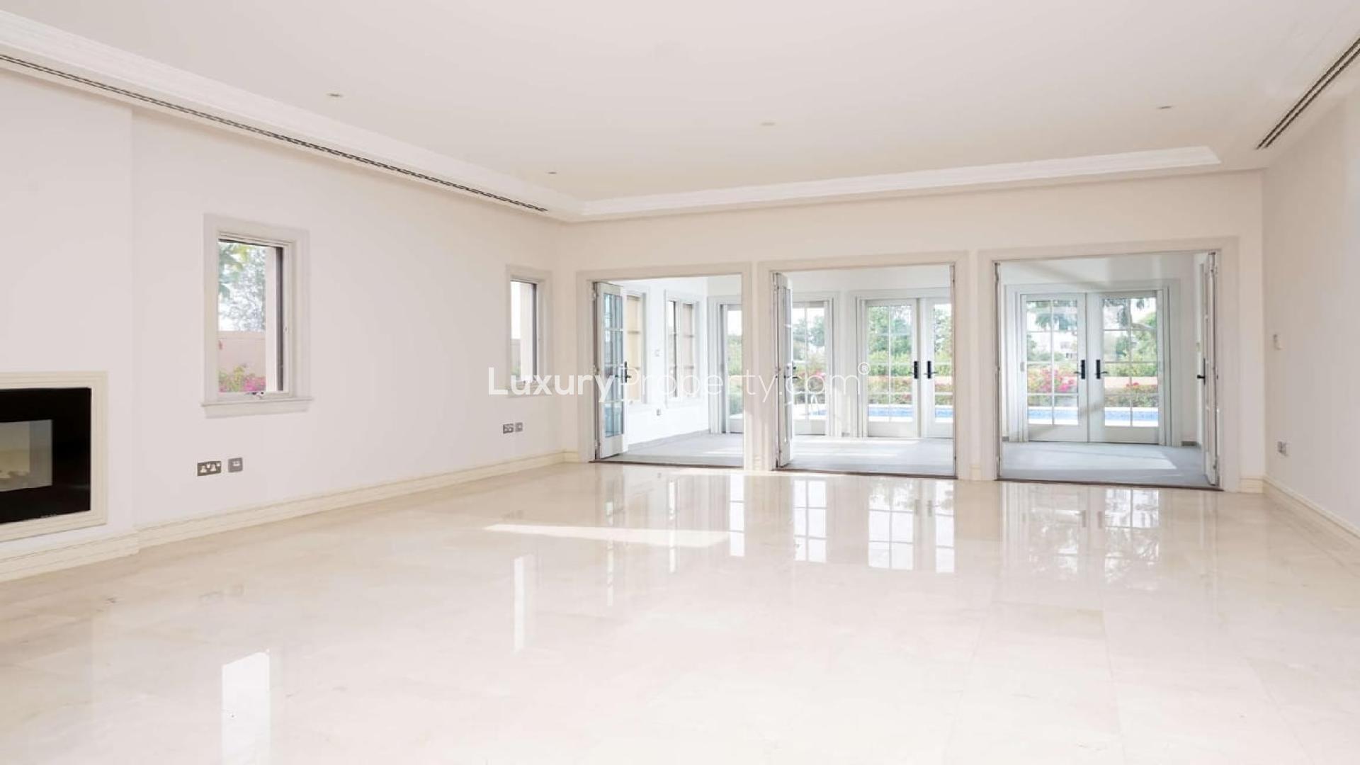 Mediterranean-style villa exterior with pool, Redwood Avenue, Jumeirah Golf Estates, for rent