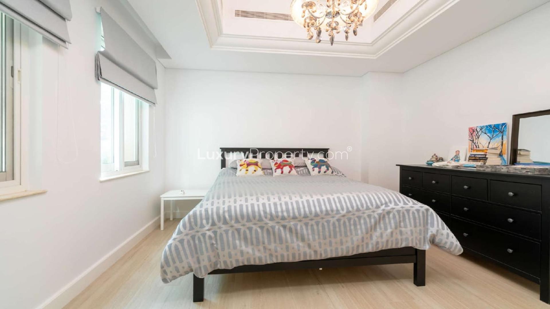 Elegant living room in upgraded Dubai Sports City villa, featuring modern decor and natural light