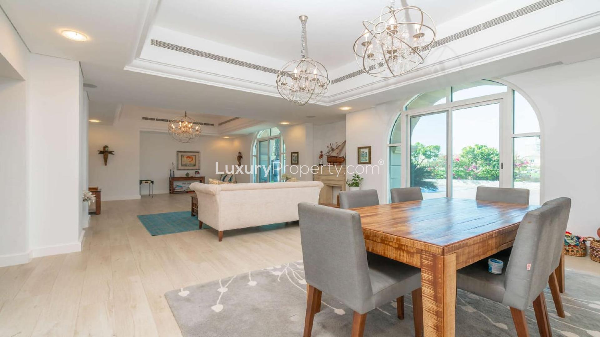 "Stunning Victory Heights villa with private pool and golf course view in Dubai Sports City.","Spacious living room in upgraded B1 villa, Victory Heights, Dubai Sports City, elegant décor.",Luxurious living room in fully upgraded Victory Heights villa, Dubai Sports City
